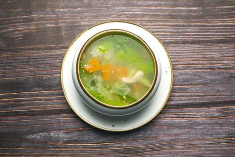 Chicken Vegetable soup include cabbage, carrot and belle pepper served in b.. Stock Photos