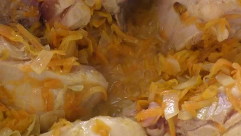 Chicken with vegetables is fried in a pan Video stock 167440545