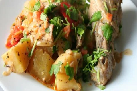 Chicken with vegetables Stock Photos