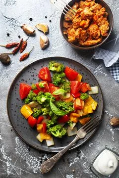 Chicken with vegetables Stock Photos