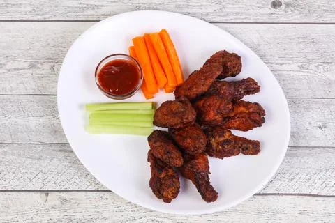 Chicken wings bbq with celery and carrot Stock Photos
