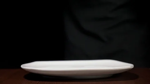 Chicken wings in breading. Buffalo wings spread on food paper. They are very Stock Footage 89974495