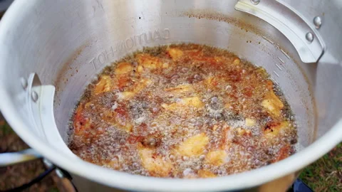 Chicken Wings Deep Frying In Bubbling Hot Oil Stock Footage 346649658