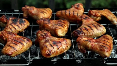 Chicken wings grill, which are being grilled on barbecue Stock Footage 112668347