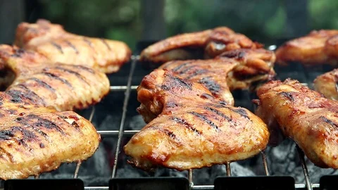 Chicken wings grill, which are being grilled on barbecue Stock Footage 112807767