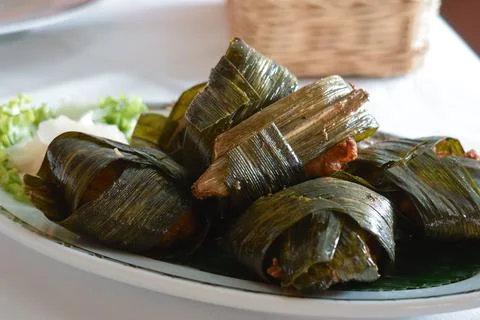 Chicken wrapped with pandan leaf Stock Photos
