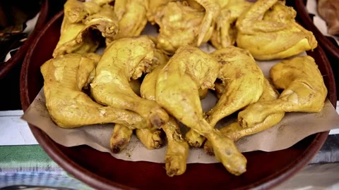 Chicken in yellow ready to be fried on clay plate 動画素材 272297423