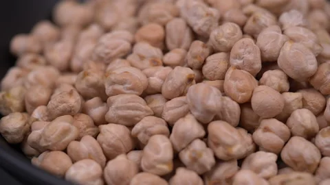 Chickpea beans rotate. Close-up of chickpea beans Vídeo Stock 137088467