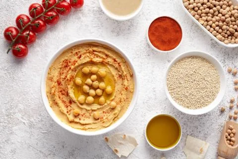 Chickpea hummus flat lay with ingridients, healthy diet natural vegetarian snack Stock Photos