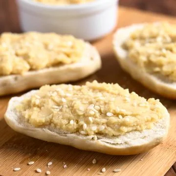 Chickpea Spread on Bread Stock Photos