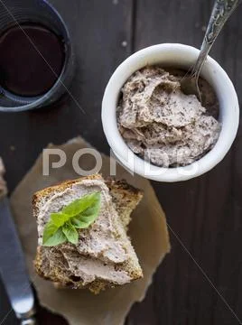 Chickpea spread with homemade wholegain bread. Stock Photos