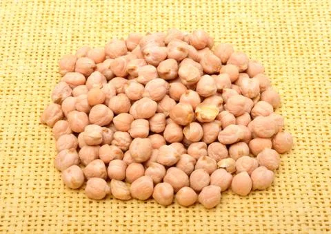 Chickpea on the yellow tablecloth Stock Photos