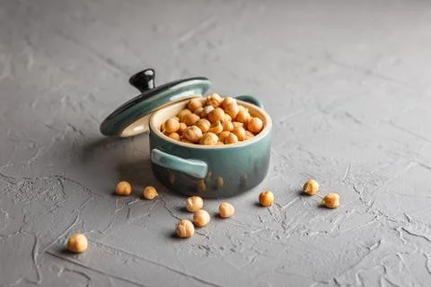 Chickpeas in asaucepan on a gray background Stock Photos