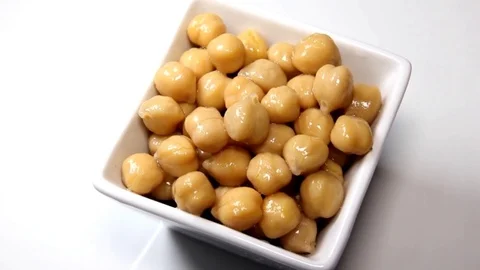 Chickpeas boiled on a square bowl with a rotating frame Stock Footage