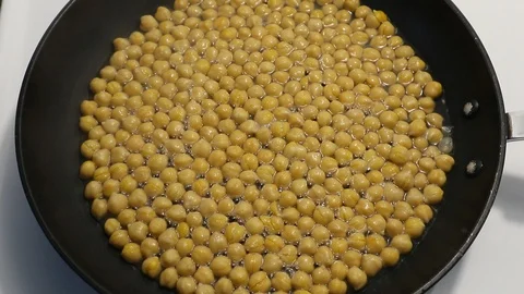 Chickpea's Boiling in Pan Plant-based protein Stock Footage 128247482