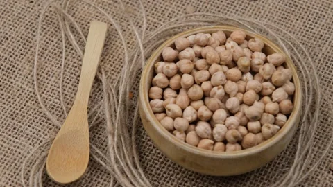 Chickpeas bowl spoon Stock Footage 260500843