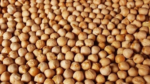 Chickpeas chickpea grains rotating pattern macro texture background backdrop Stock Footage 91379639
