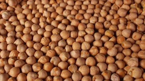 Chickpeas chickpea grains rotating pattern macro texture background backdrop Stock Footage 91379664