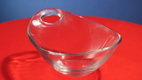 Chickpeas falling into a bowl Stock Footage 112648765