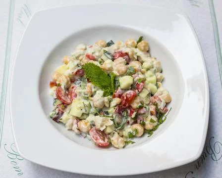Chickpeas salad with vegetables Stock Photos
