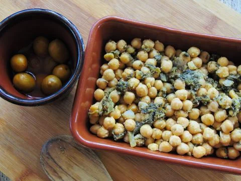 Chickpeas with spinach. Stock Photos