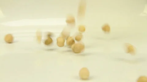 Chickpeas sprinkled on a white background Stock Footage 49092600