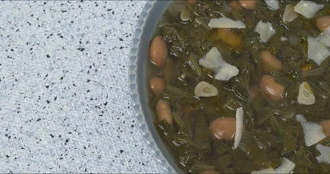 Chicory and bean soup. Copy space. Stock Footage 311799487