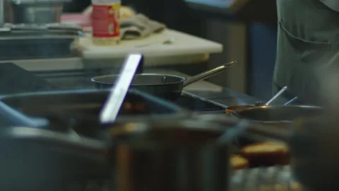 Chief is cooking at the cinematic kitchen Video stock 240868174