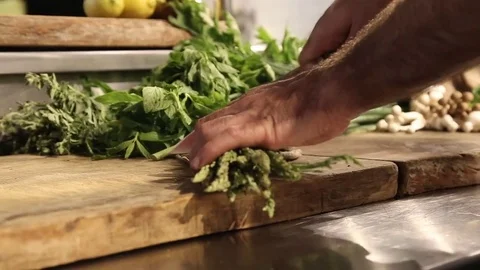 Chief cutting greens. Kitchen restaurant. Stock Footage 74474424