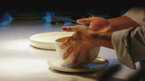 Chief is ending the preparing of the meal Stock Footage 240868102