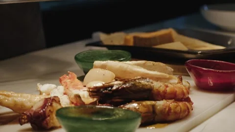Chief is ending the preparing of the seafood Stock Footage 240915908