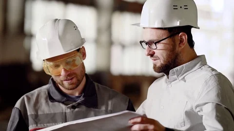 Chief engineer and master of construction at an industrial facility. The Stock Footage 76643454