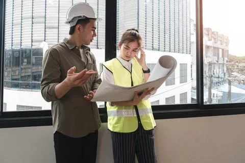 The chief engineer has a stress discussion with the engineering team about the Stock Photos