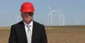 Chief Engineer Man Looking Camera Wind Turbines Farm Green Energy Windmills Spin 4k or 4k+ Resolution