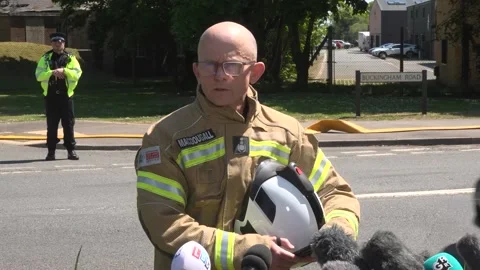 Chief Fire Officer reads statement following firefighter deaths in Bicester  Stock Footage 309305693