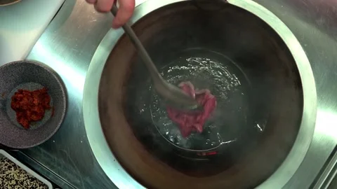 Chief Frying Beef Strips In A Wok. Top View. Stock Footage 159508792