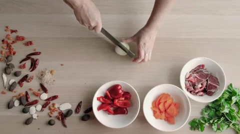 Chief Hands Cutting Onions, Making Salad. Top View Chief Cutting Vegetables Stock Footage 68190361