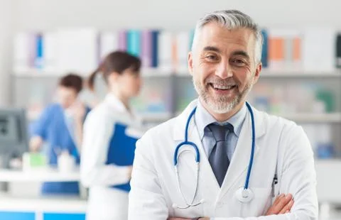 Chief physician posing in the office Stock Photos