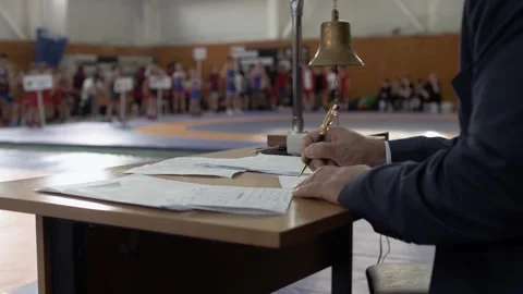 The chief referee signs the documentation and conducts the scoring Stock Footage 263739381