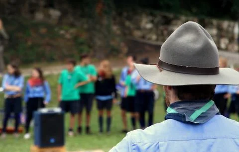 Chief scout with the typical hat while controlling their kids Stock Photos