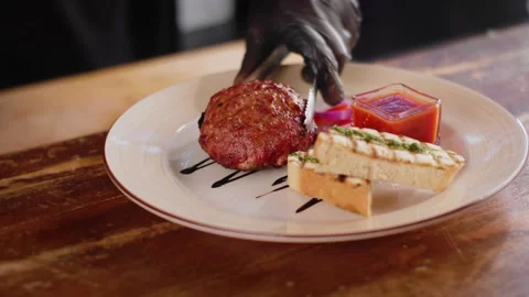 The chief serves the cutlet. Close up Stock Footage 131152168