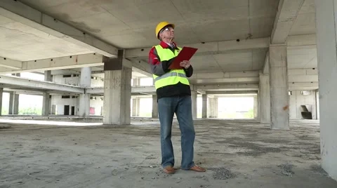 Chief superintendent engineer at construction site Stockbeeldmateriaal 50600260