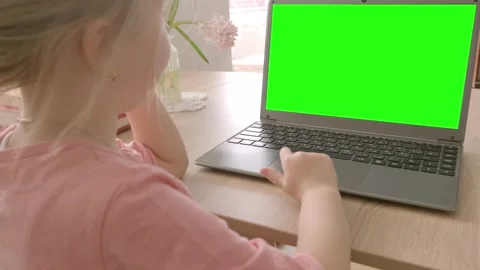 Child 5-year old studying distance learning course, green screen display fo.. Video stock 275590358