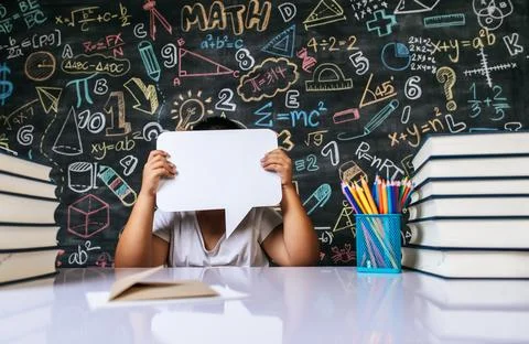 Child acting with speech bubble in the classroom Stock Photos