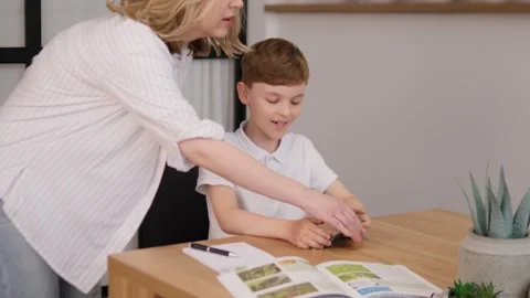A Child Actively Engaged in Learning with Meaningful Parent Interaction and Stock Footage 312219158