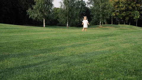 The child is actively playing and moving fun. Stock Footage 108058695