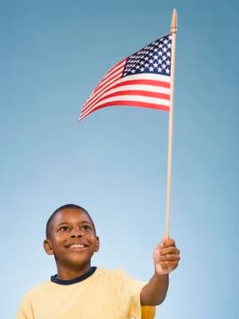 Child with American flag. Stock Photos