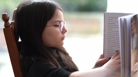 Child and book Stock Footage 302625318
