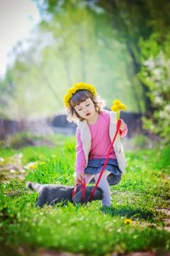 A child and a cat. Selective focus. Stock Photos