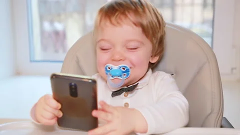 Child and smartphone Stock Footage 148992439